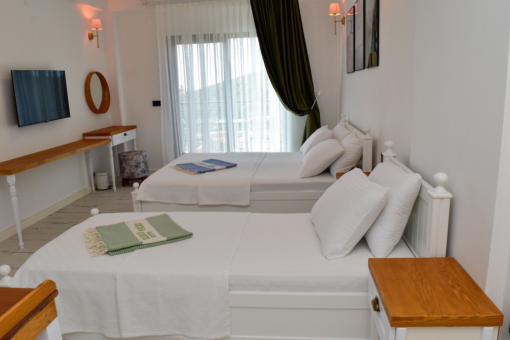 Deluxe Triple Room, Balcony, Sea View - Photo 15