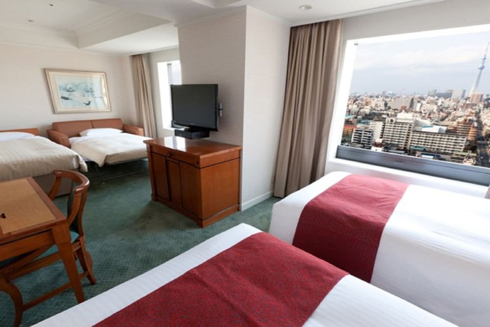 [Non-Smoking] Deluxe Family Twin Room (with 1 Extra bed + 1 Sofa bed) photo 3