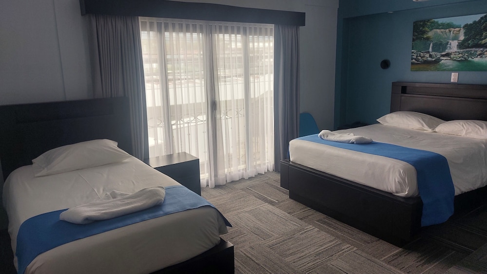 Junior Triple Room, Multiple Beds photo 1