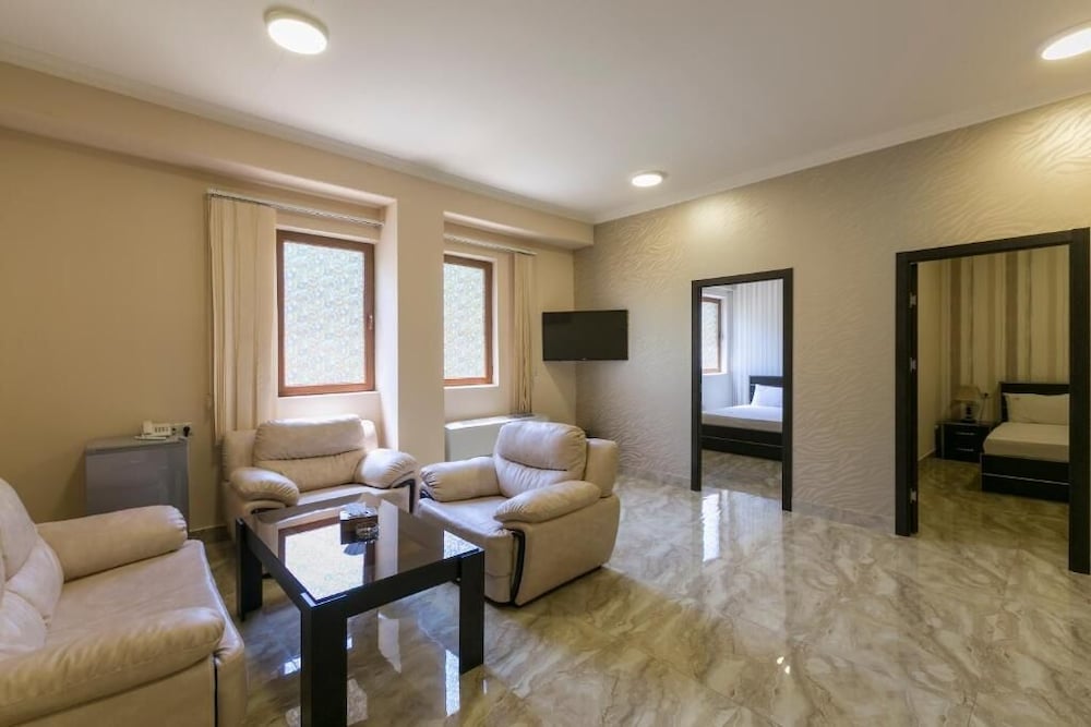 Deluxe Quadruple Room, 2 Queen Beds