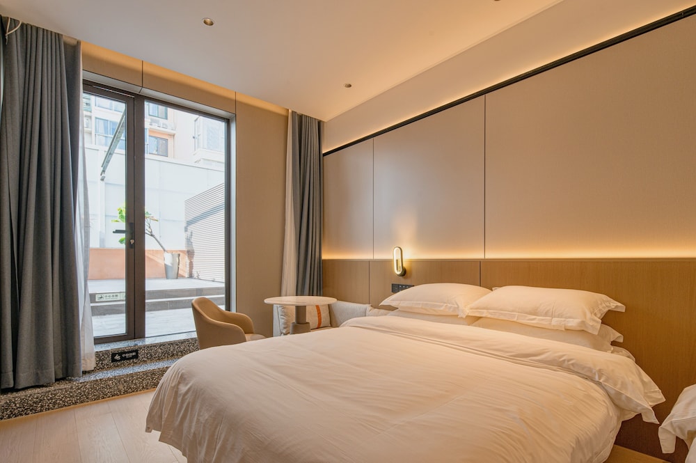 Family Twin Room with Courtyard View (1.2m & 1.8m Beds)