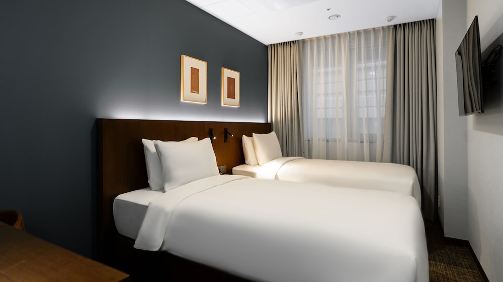 Standard Twin Room - Photo 7