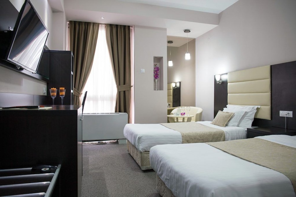 Superior Triple Room, City View