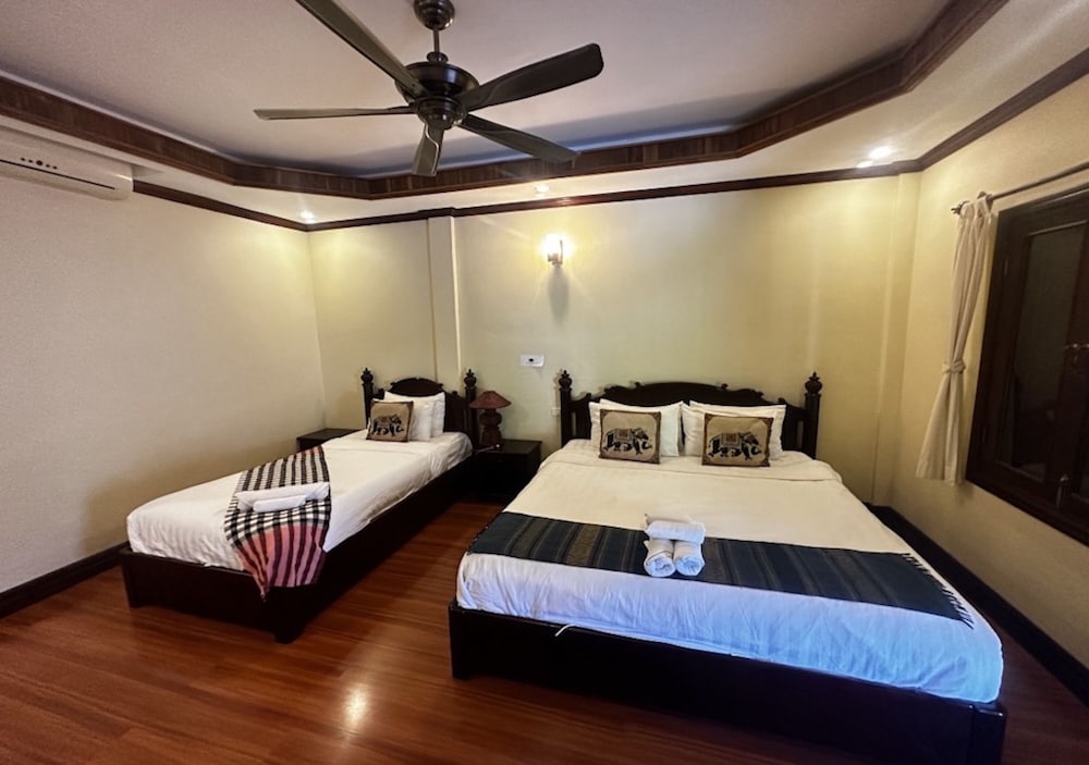 Deluxe Triple Room - Photo 18