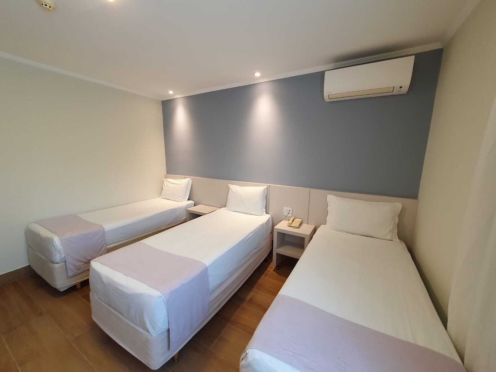 Quarto Triplo Solteiro Premium photo 1