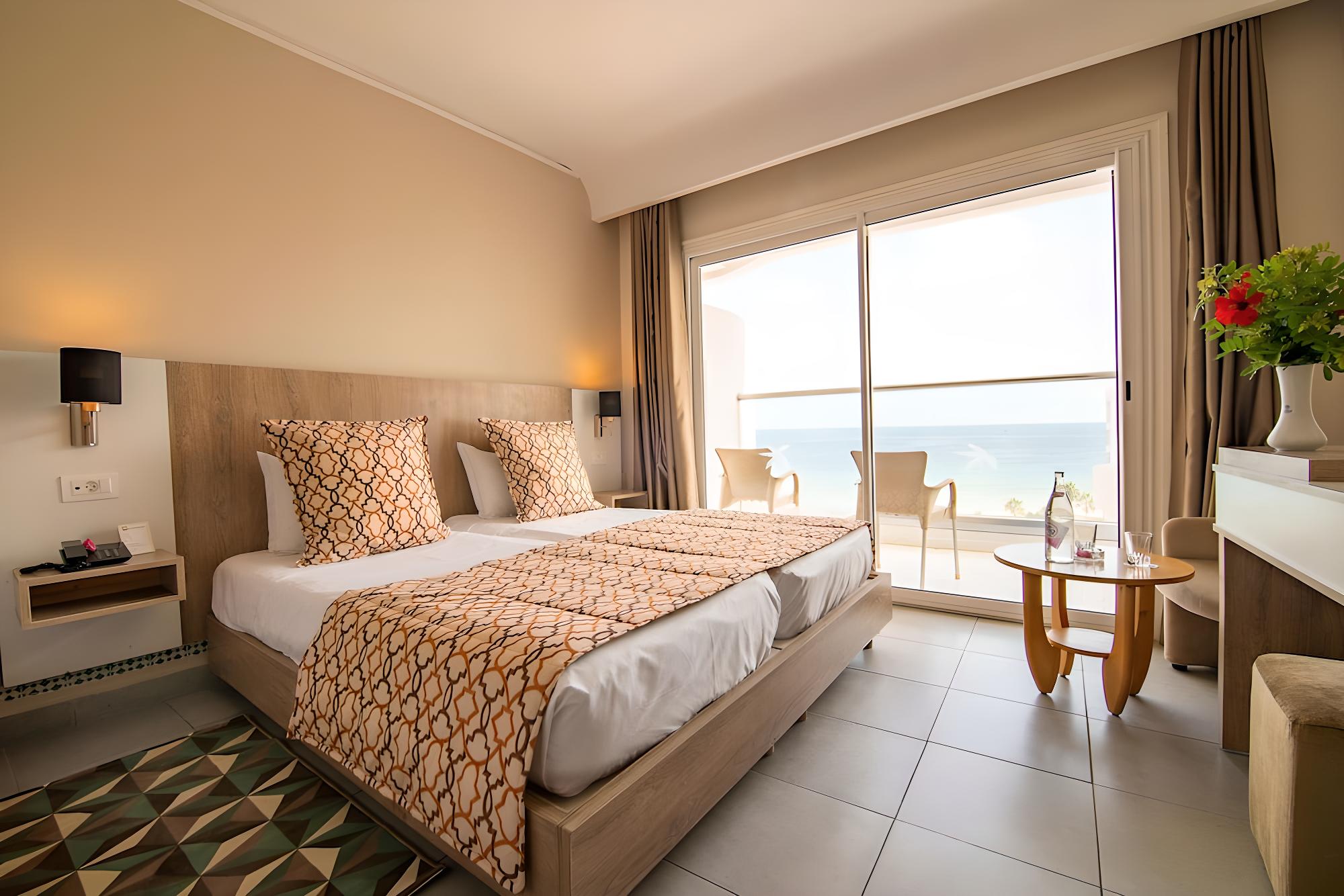 Relax in this stylish room with stunning ocean views!