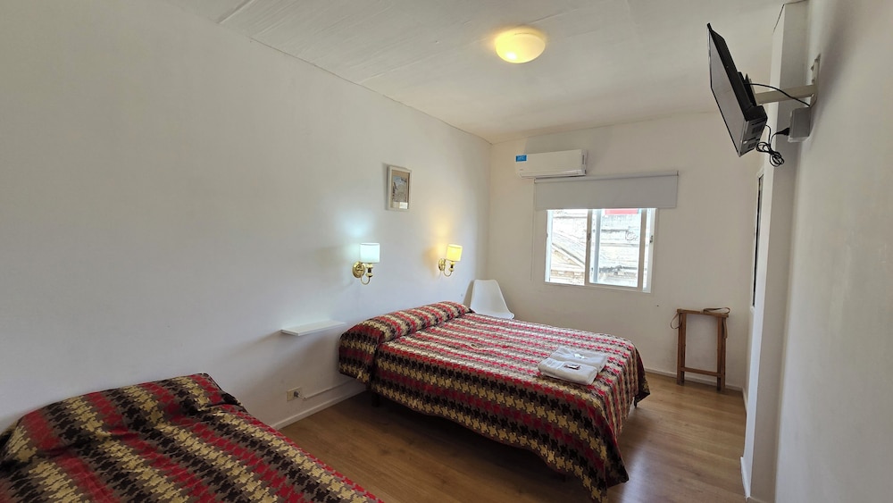 Classic Triple Room, City View