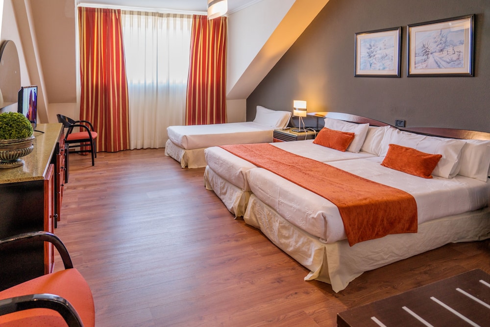 Habitación Triple (2 adultos + 1 niño)