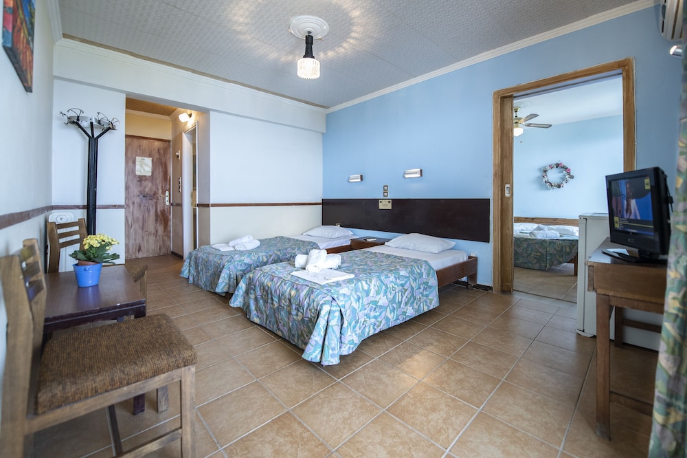 Quadruple Room, Beach View photo 3