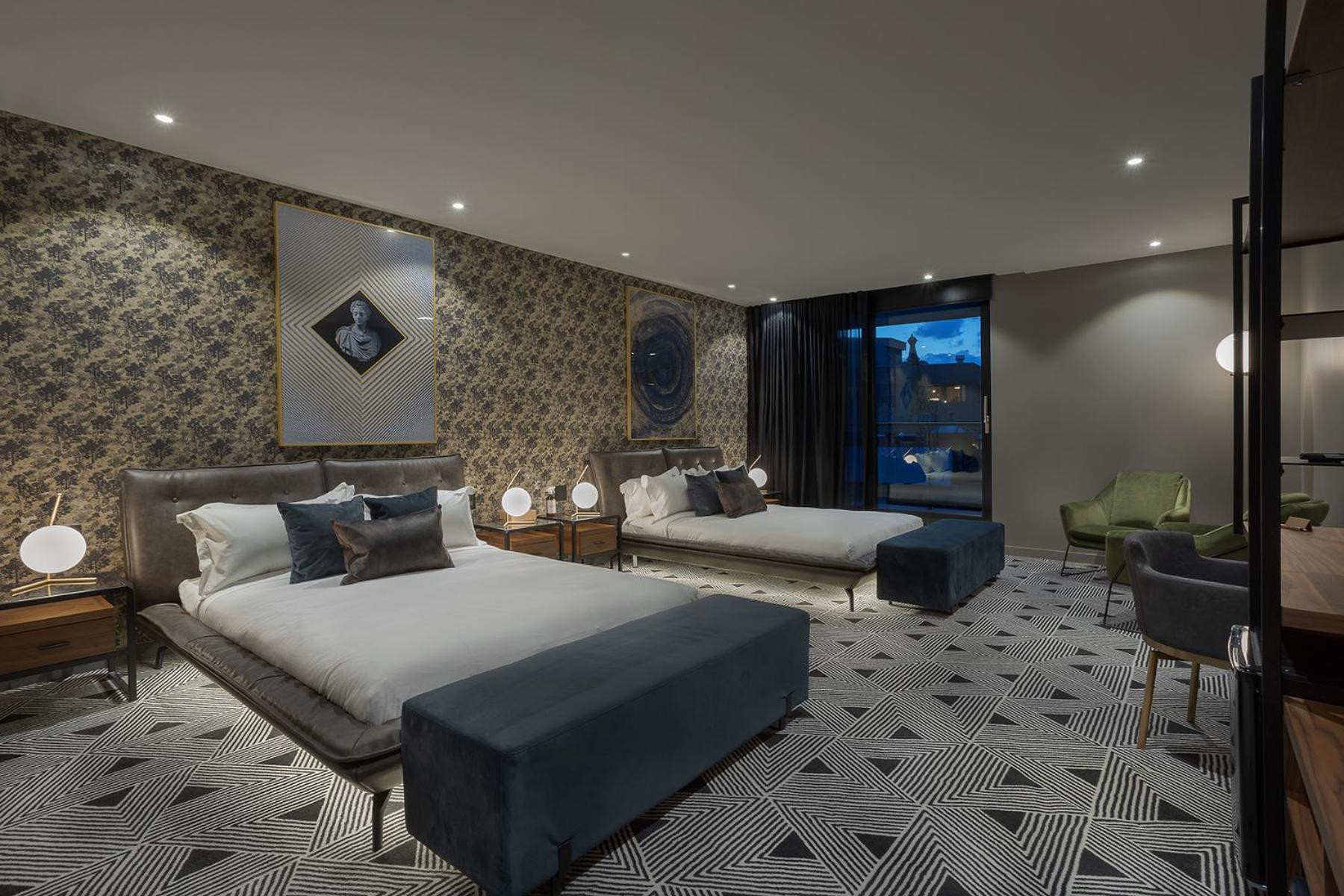 Deluxe Queen Room With Two Queen Beds photo 1