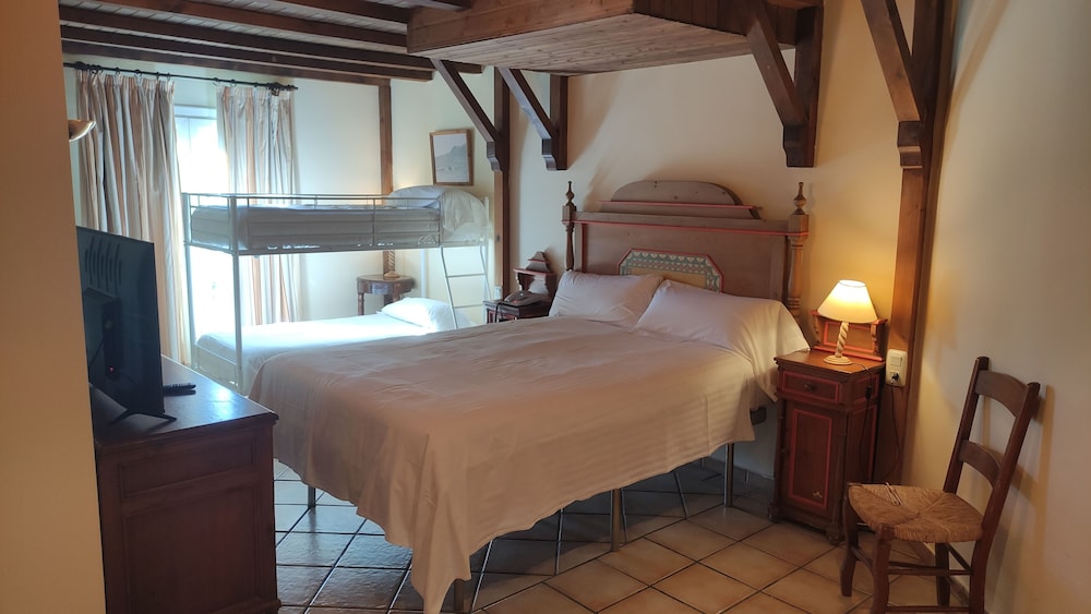 Habitación Cuádruple Premium (2 Adultos y 2 Niños)