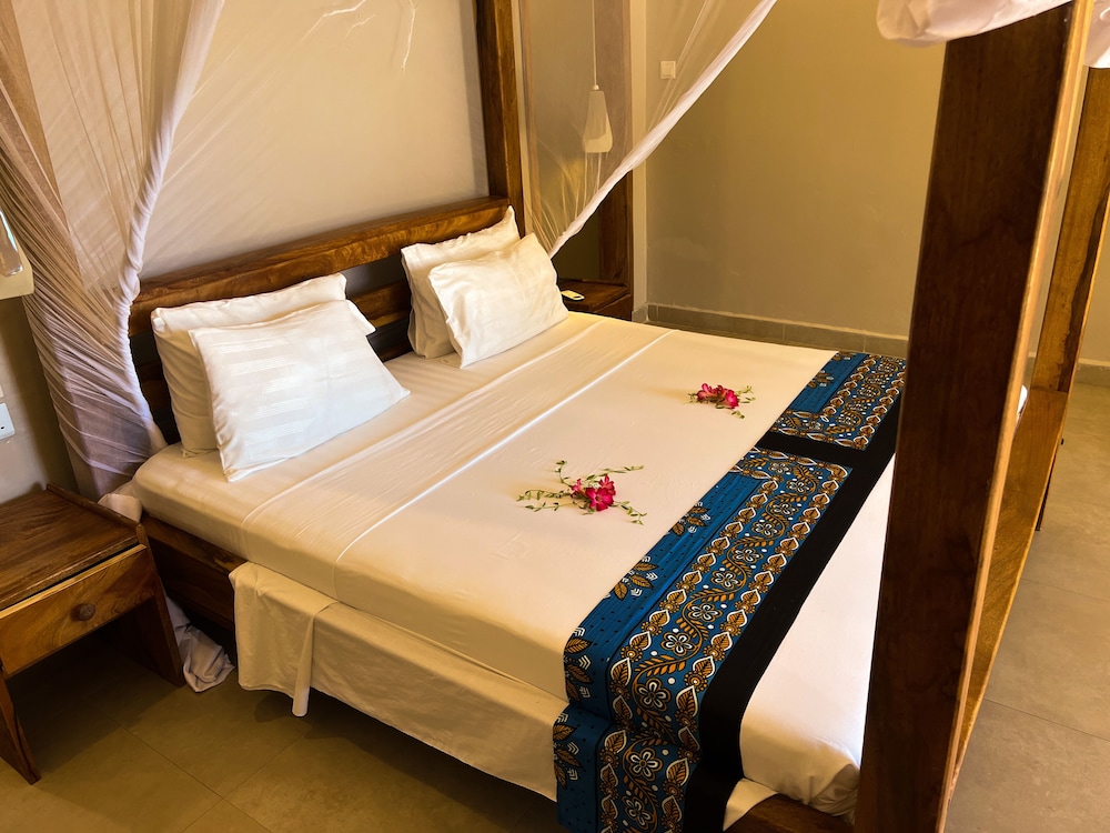 Deluxe Quadruple Room, 2 Bedrooms, Ensuite, Partial Ocean View photo 1