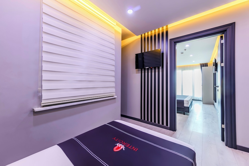 Deluxe Triple Room - Photo 9