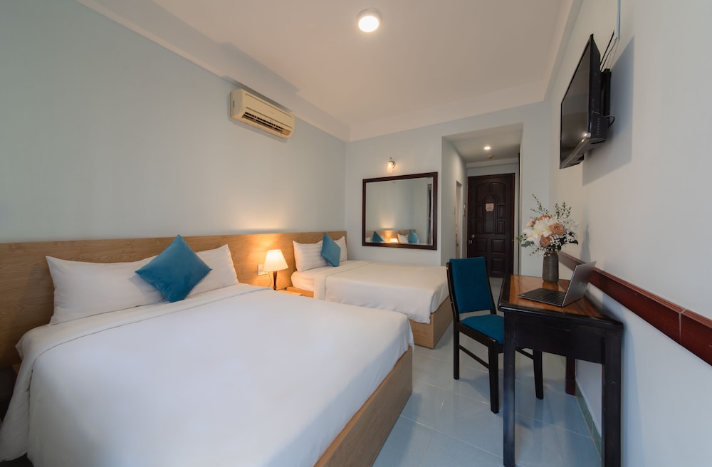Deluxe Quadruple Room - Photo 2
