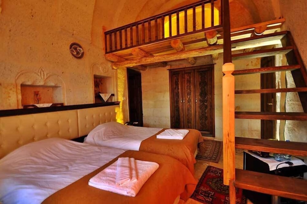 Deluxe Quadruple Room, 1 Bedroom, Non Smoking, Courtyard View