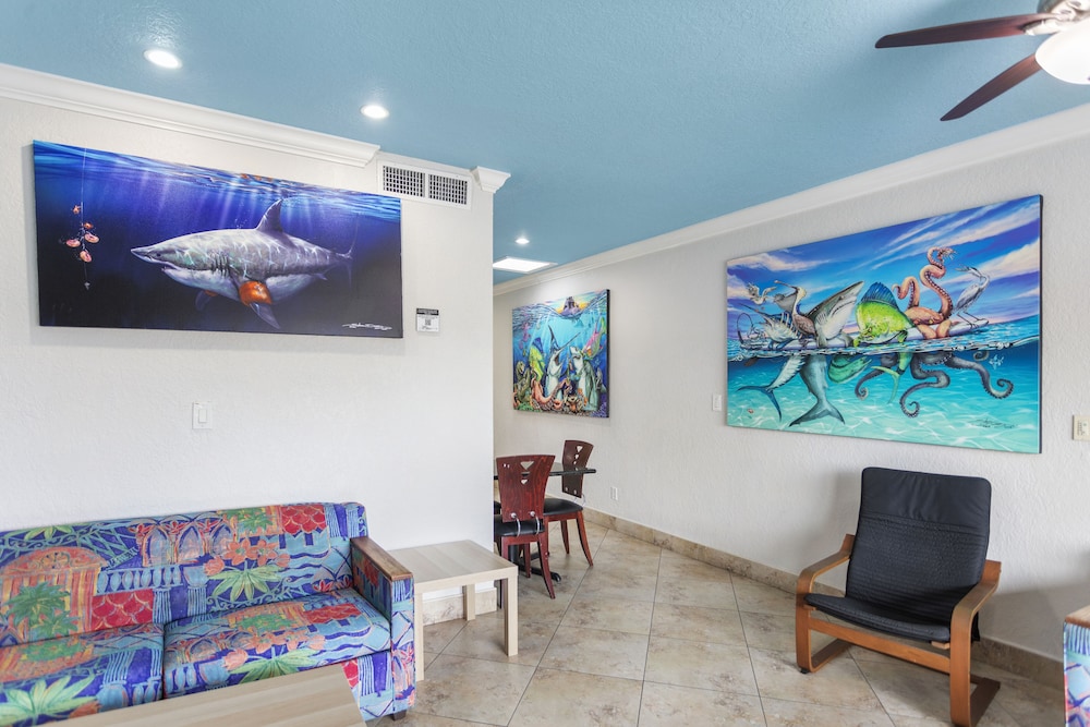 Deluxe One Bedroom Suite: 2 Queen Beds and 2 Sleeper Sofas