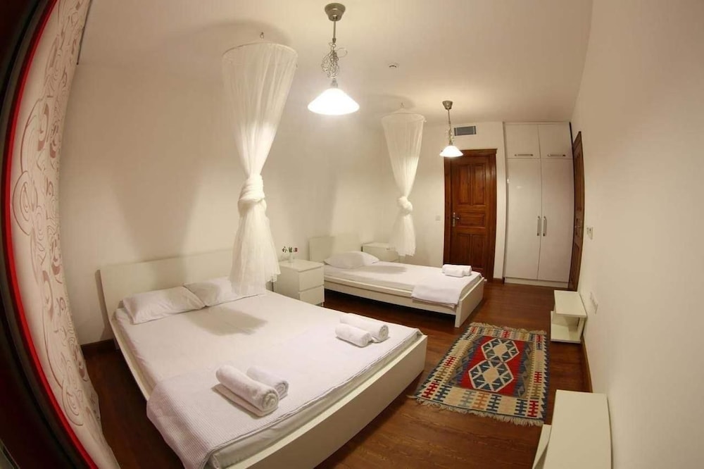 Deluxe Triple Room, Multiple Beds, Sea View photo 1