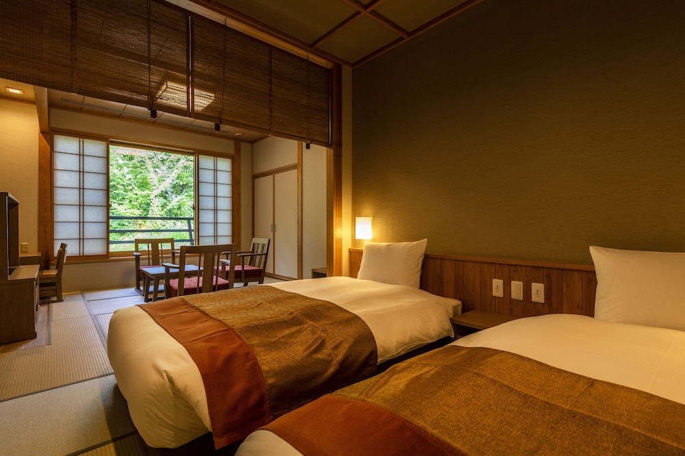 Kumonoza Japanese Western Style Room with Open-air Bath and Private Bathroom 2F - Photo 1