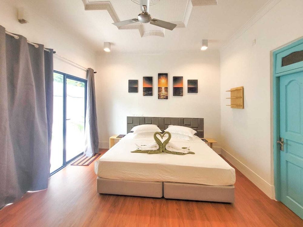 Deluxe Quadruple Room, Balcony, Garden View