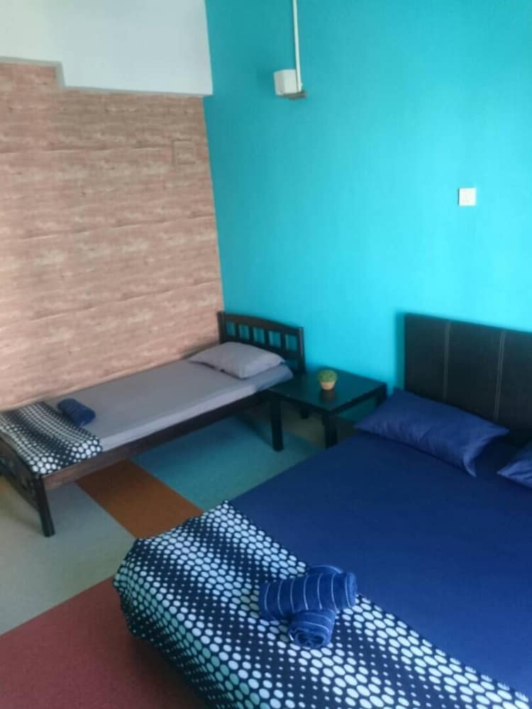Triple Room, Shared Bathroom (With Fan) photo 1