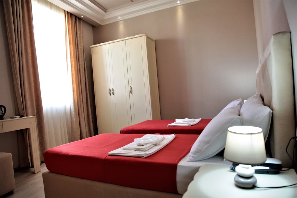 Triple Room, Multiple Beds, Courtyard View photo 2
