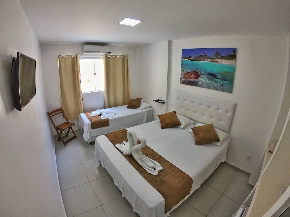 Economy Triple Room photo 2