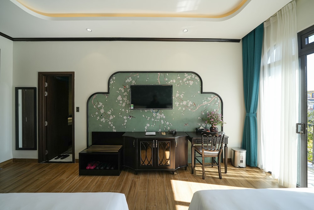 Deluxe Triple Room - Photo 10