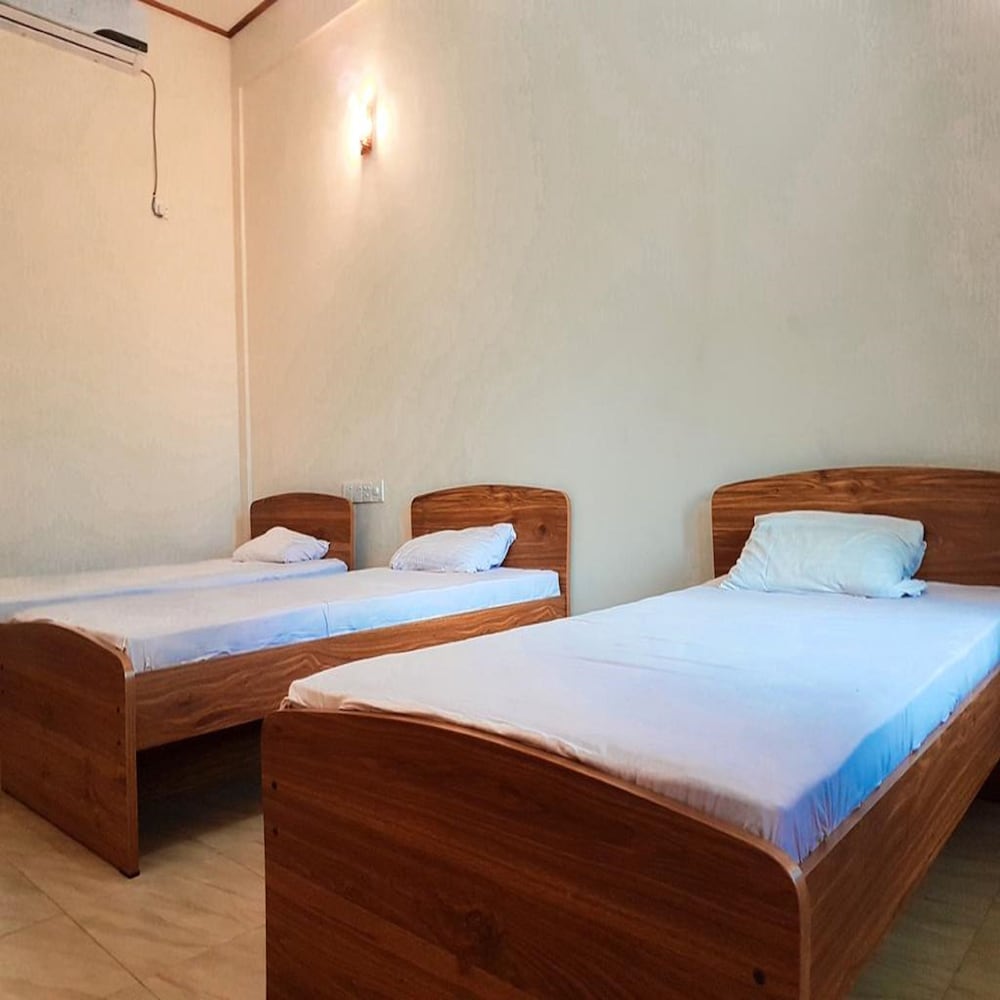 Deluxe Triple Room, 1 Bedroom, Garden View photo 1