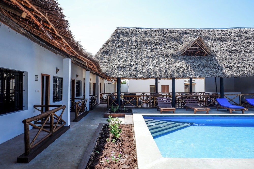 Deluxe Triple Room, Patio, Garden View