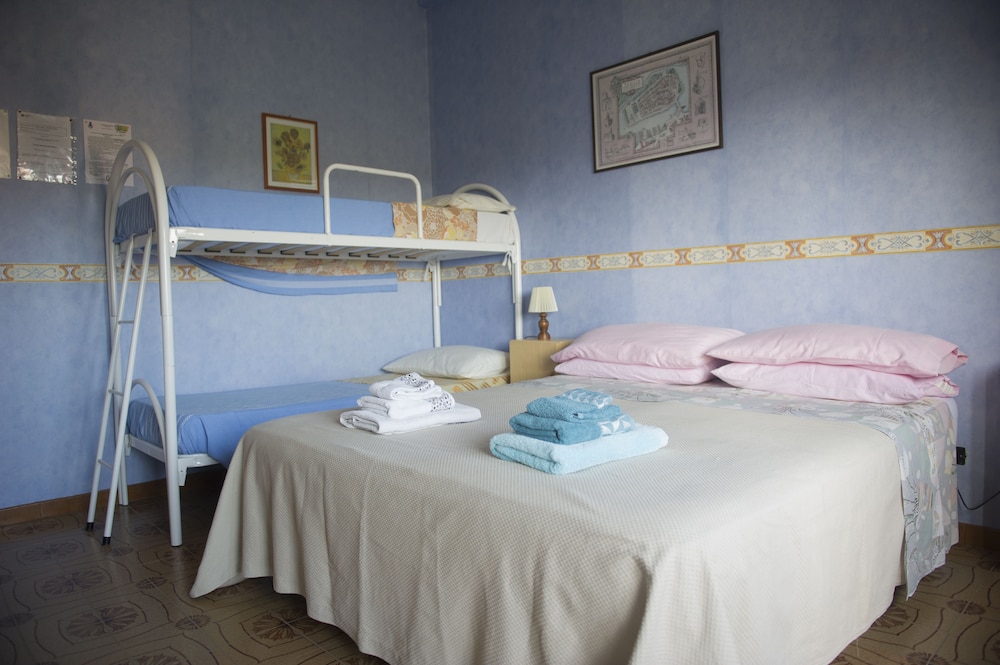 Basic Quadruple Room (Private External Bathroom)