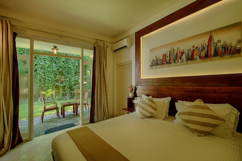 Deluxe Double Room, 1 King Bed, Patio, Garden View photo 1