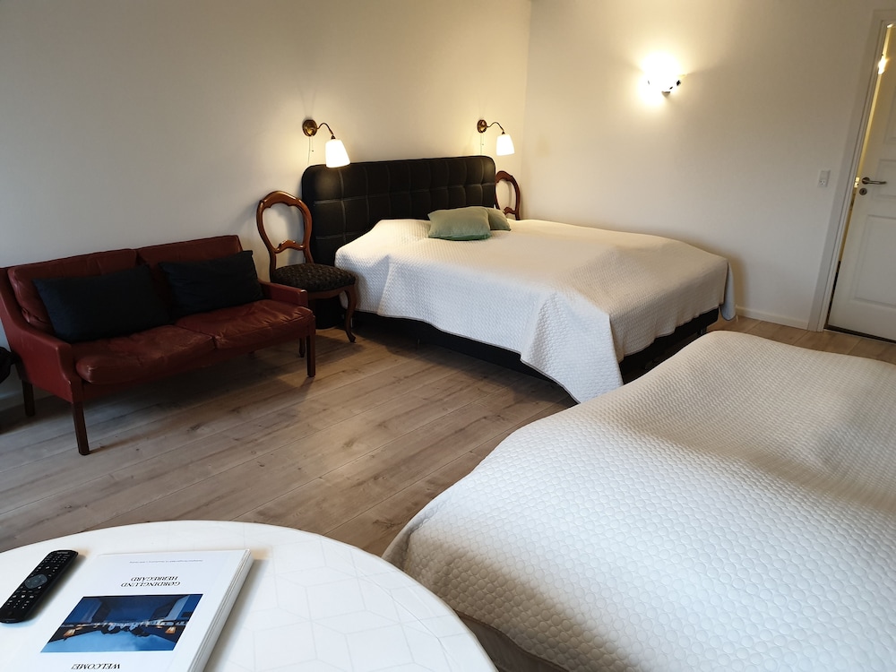 Deluxe Quadruple Room, Multiple Beds, Courtyard View