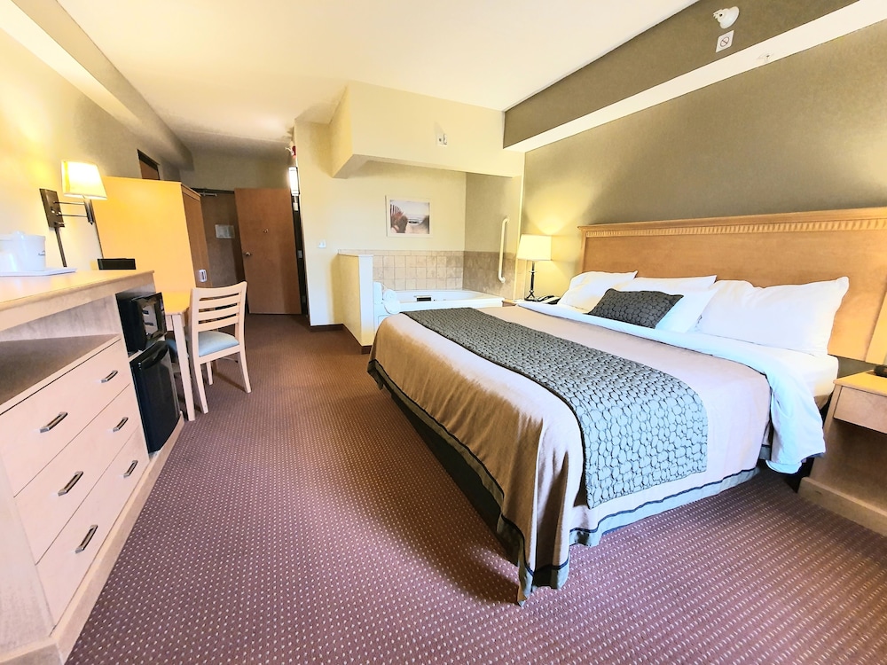 Elite Room, 1 King Bed, Jetted Tub, Fireplace, Non-Smoking - Photo 1