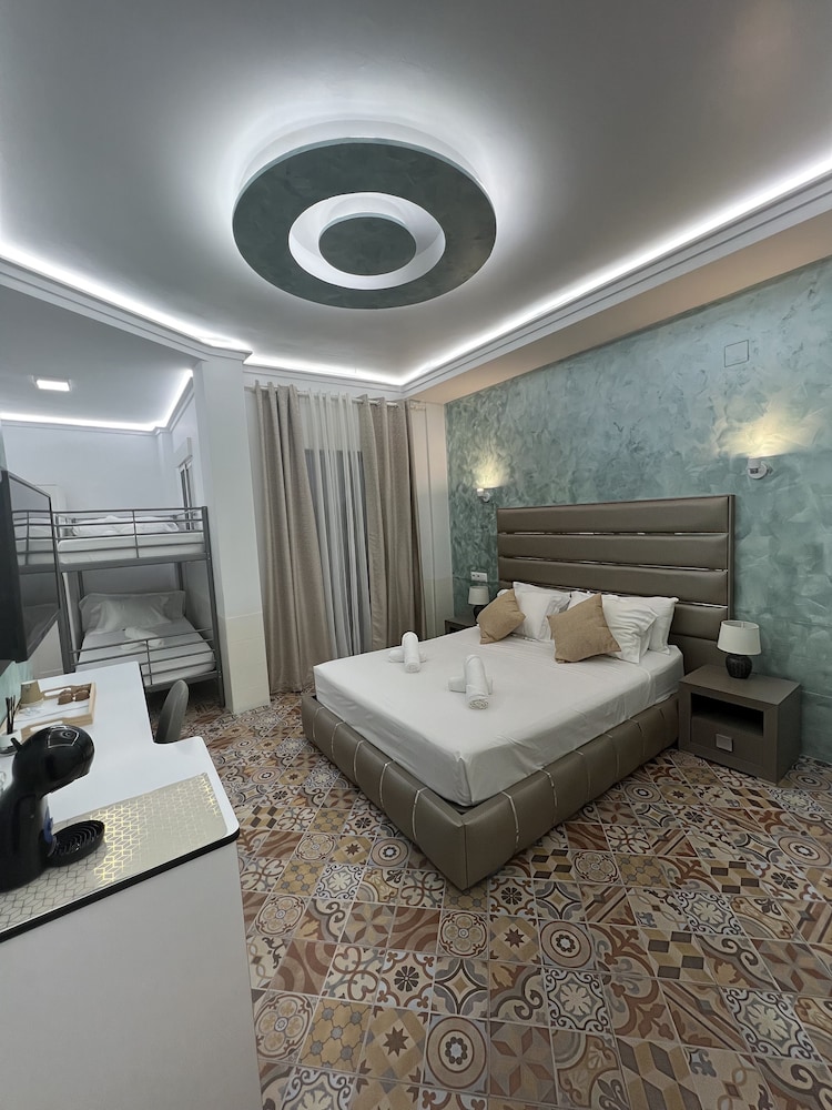Habitación Cuádruple Deluxe con Patio