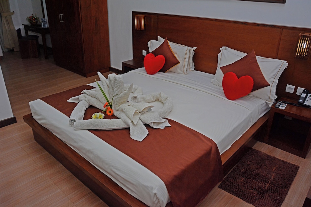 Deluxe Triple Room, Balcony, Pool View photo 1