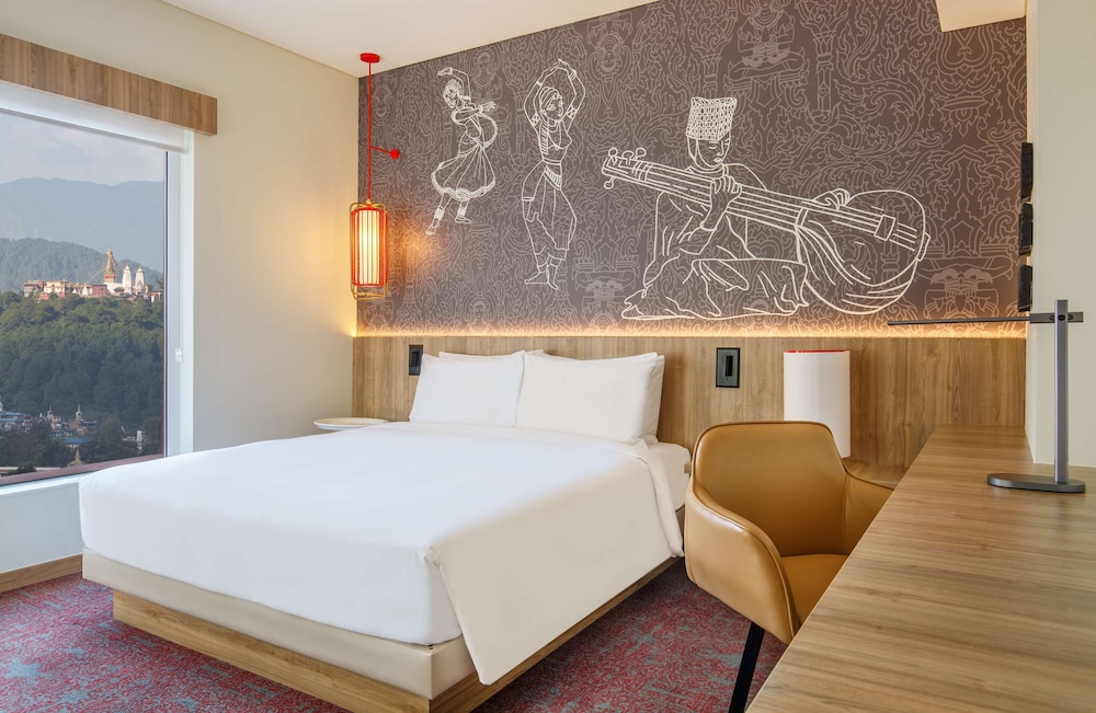 1 King Bed with Sofa seater - Photo 1