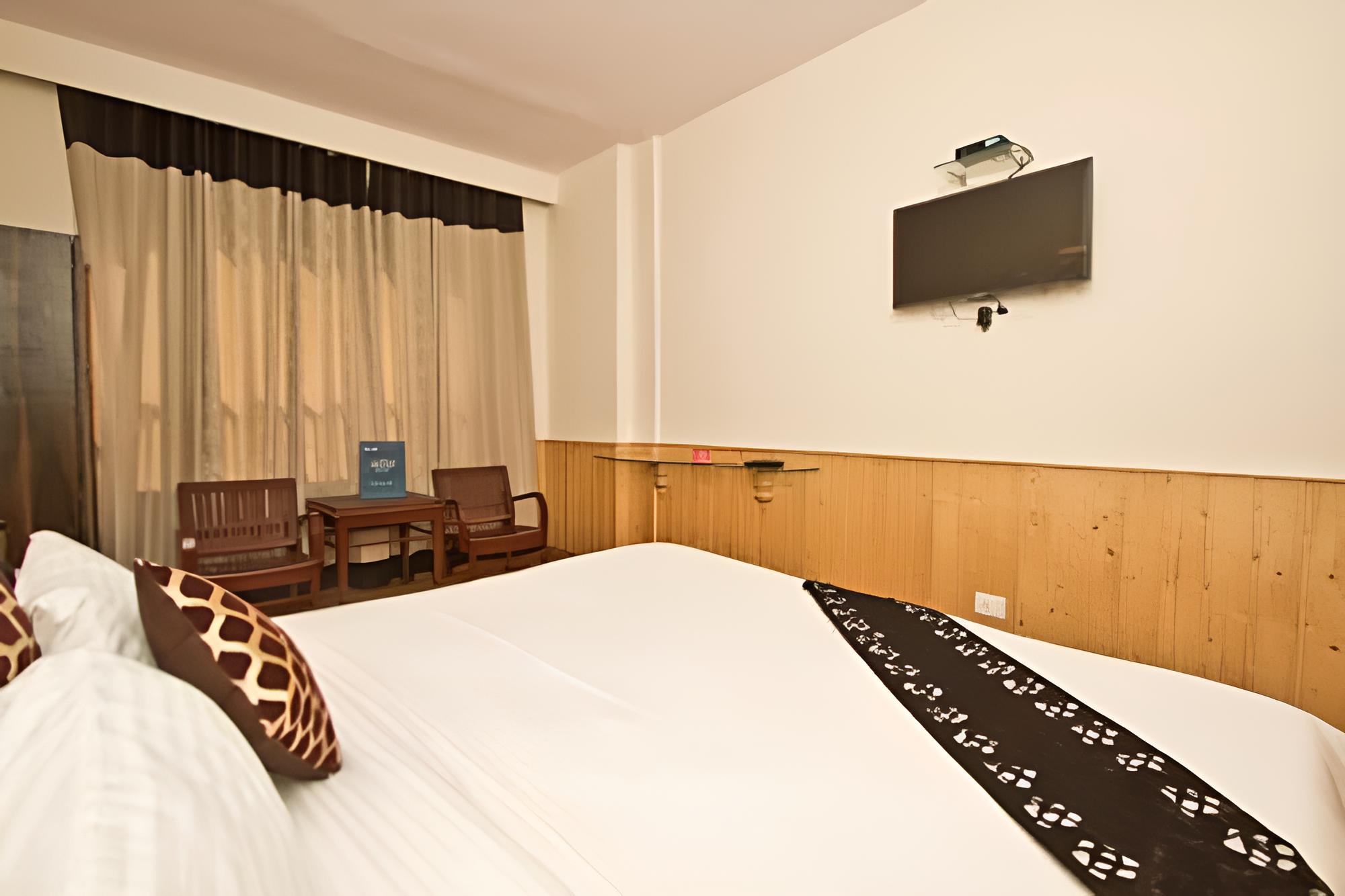 Deluxe Room - Photo 1