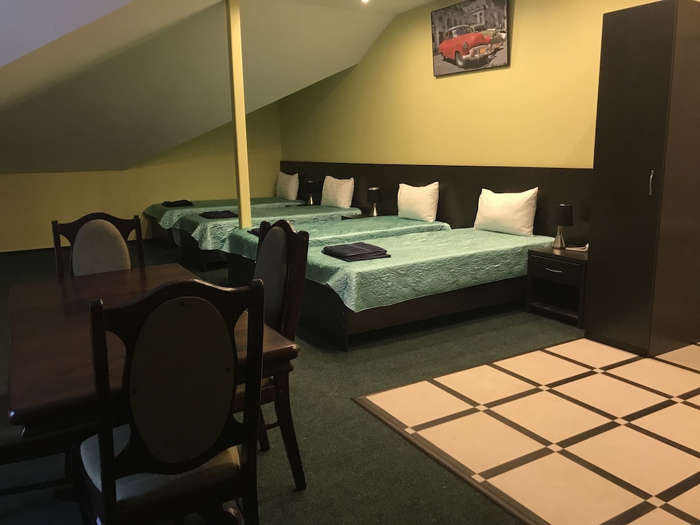 Standard Quadruple Room, Multiple Beds photo 1
