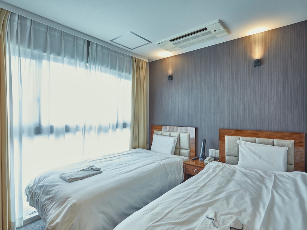 Twin Room - Photo 1