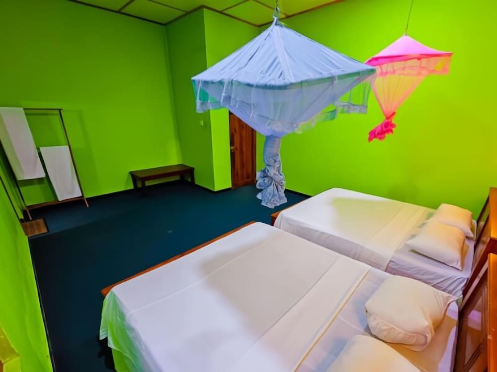 Deluxe Triple Room, 2 Queen Beds photo 2