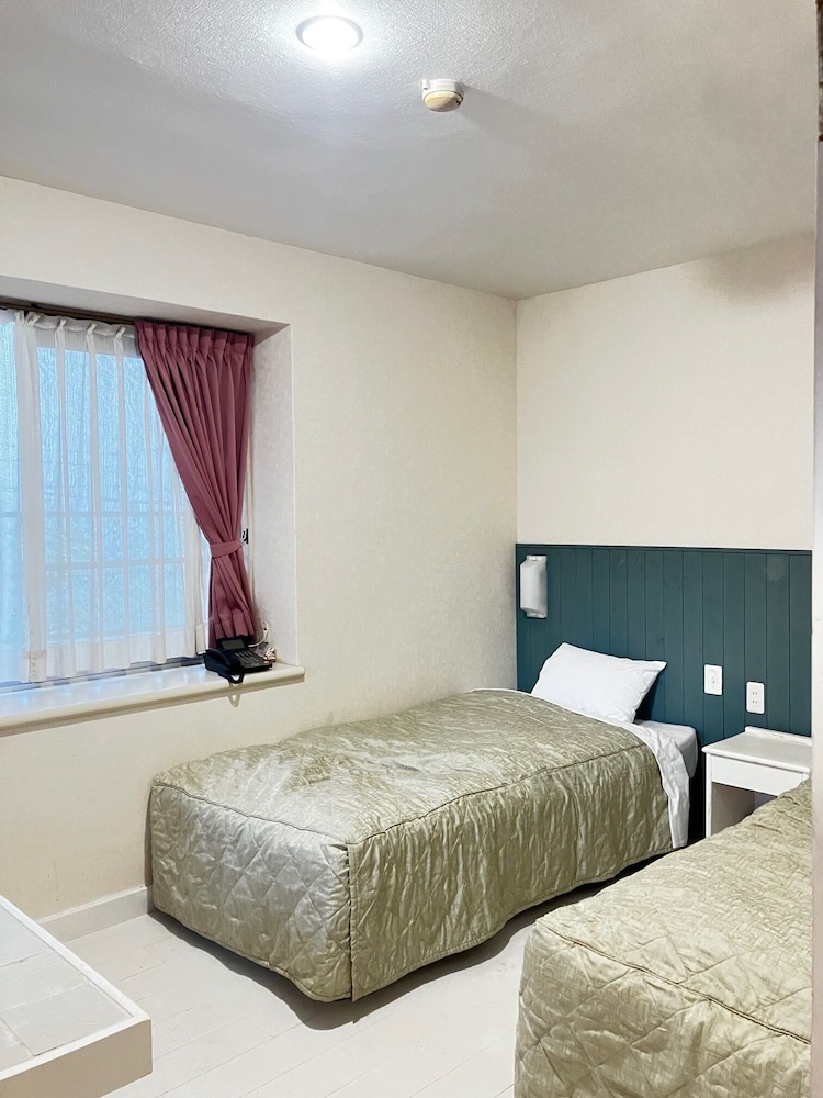 Twin Room - Photo 1