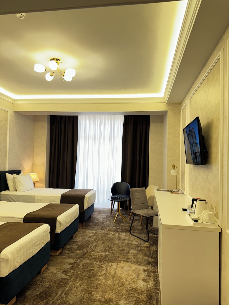 Deluxe Triple Room (Top floor) - Photo 1
