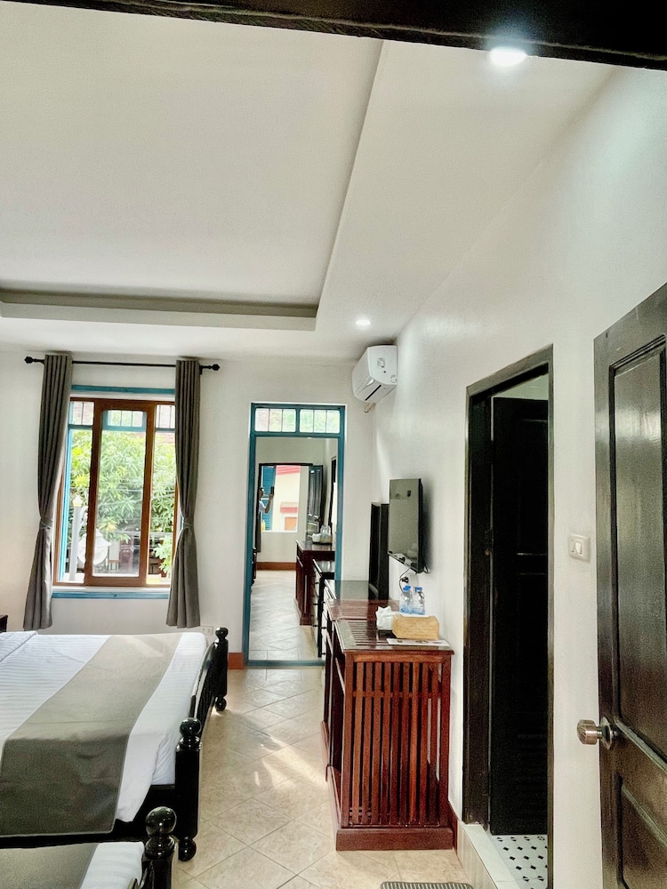 Family Triple Room, City View - Photo 13