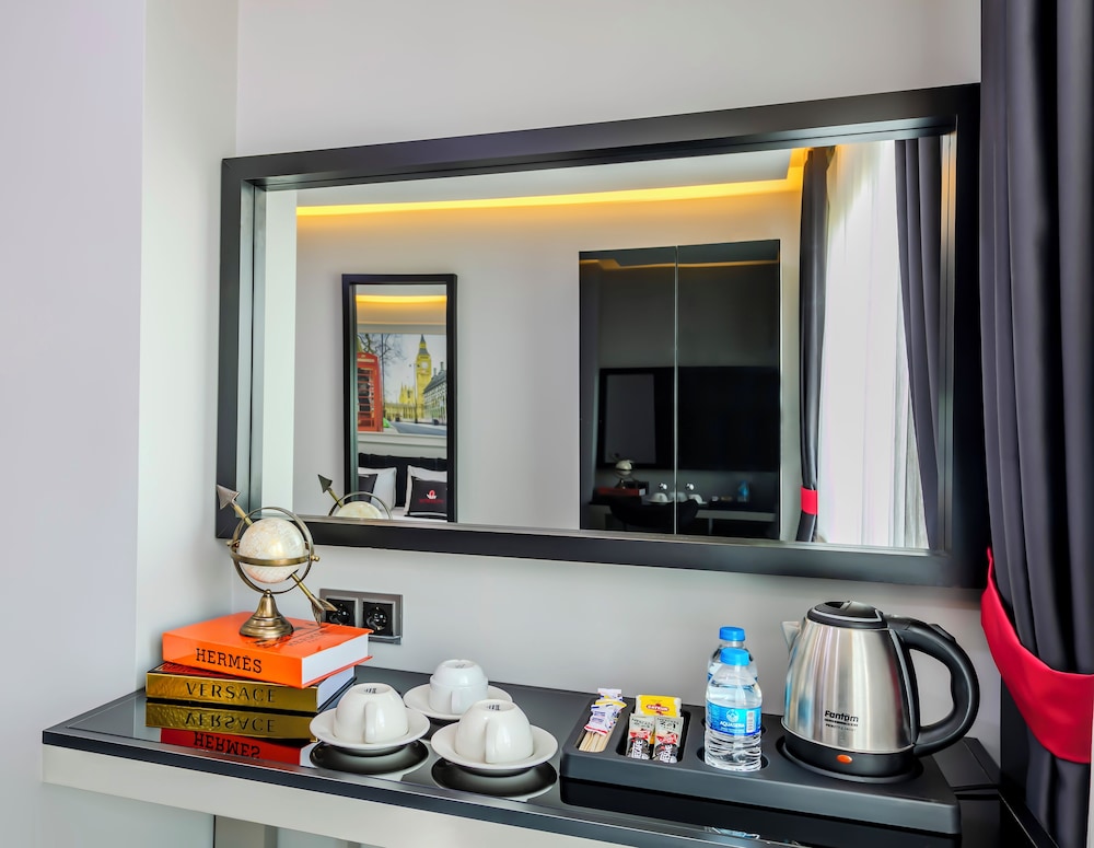 Deluxe Quadruple Room - Photo 13