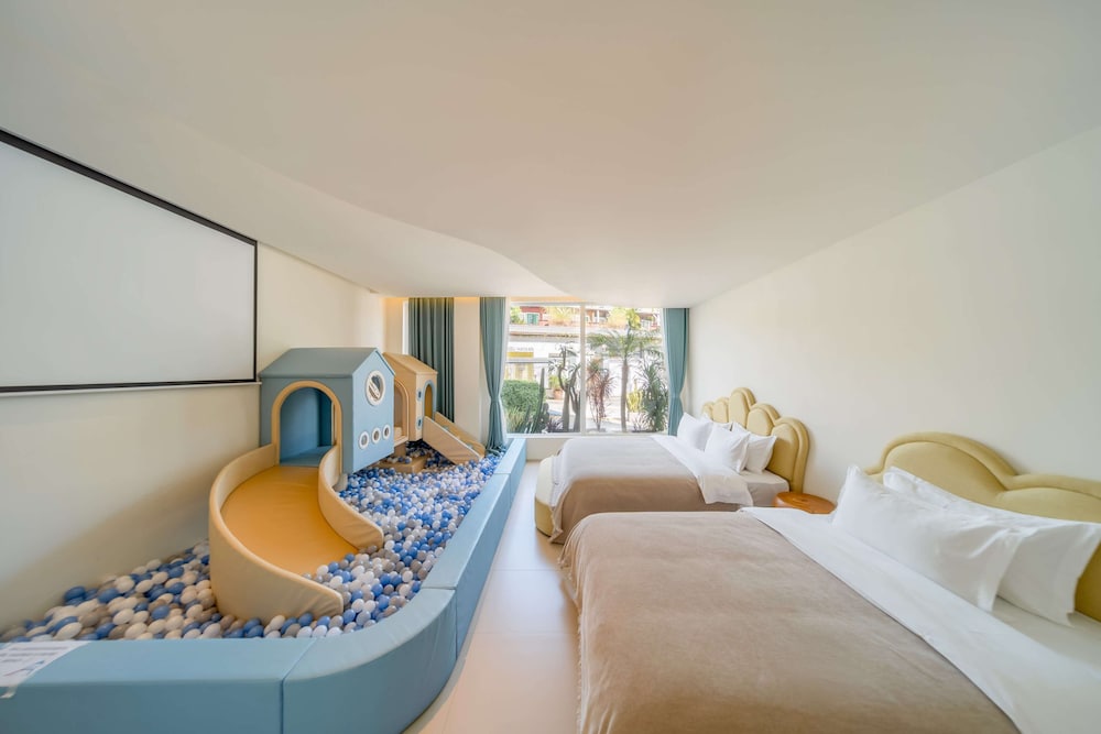 Signature Quadruple Room