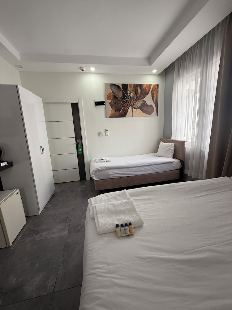 Standard Triple Room (without balcony) - Photo 11