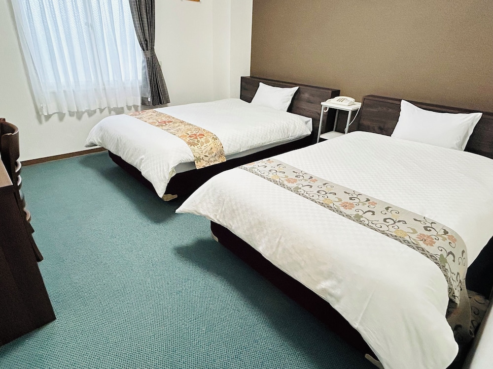 Twin Room - Photo 1