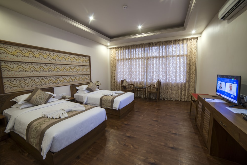 Frangipani Twin Room photo 1