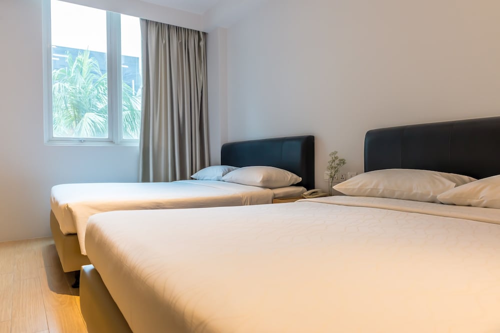 Deluxe Quadruple Room, 2 Queen Beds photo 1