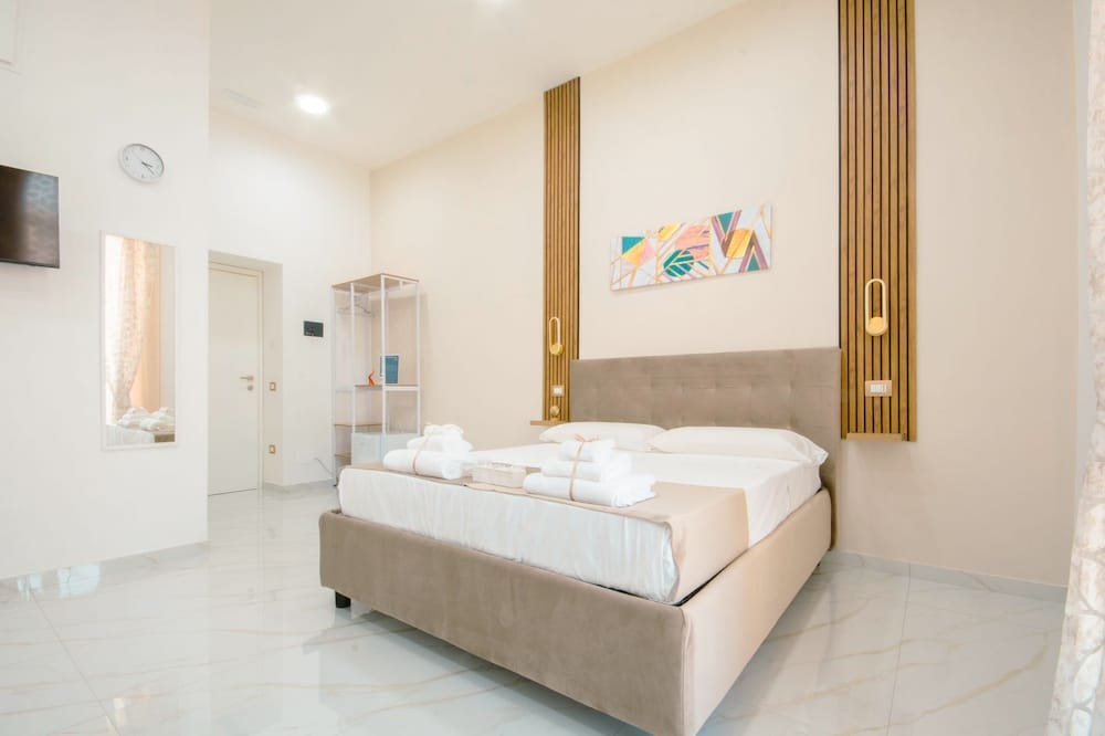Deluxe Quadruple Room, City View